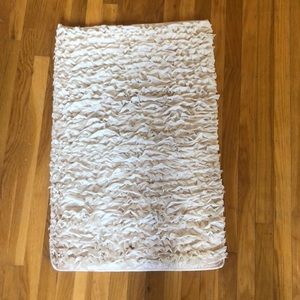Off white/ pink rug